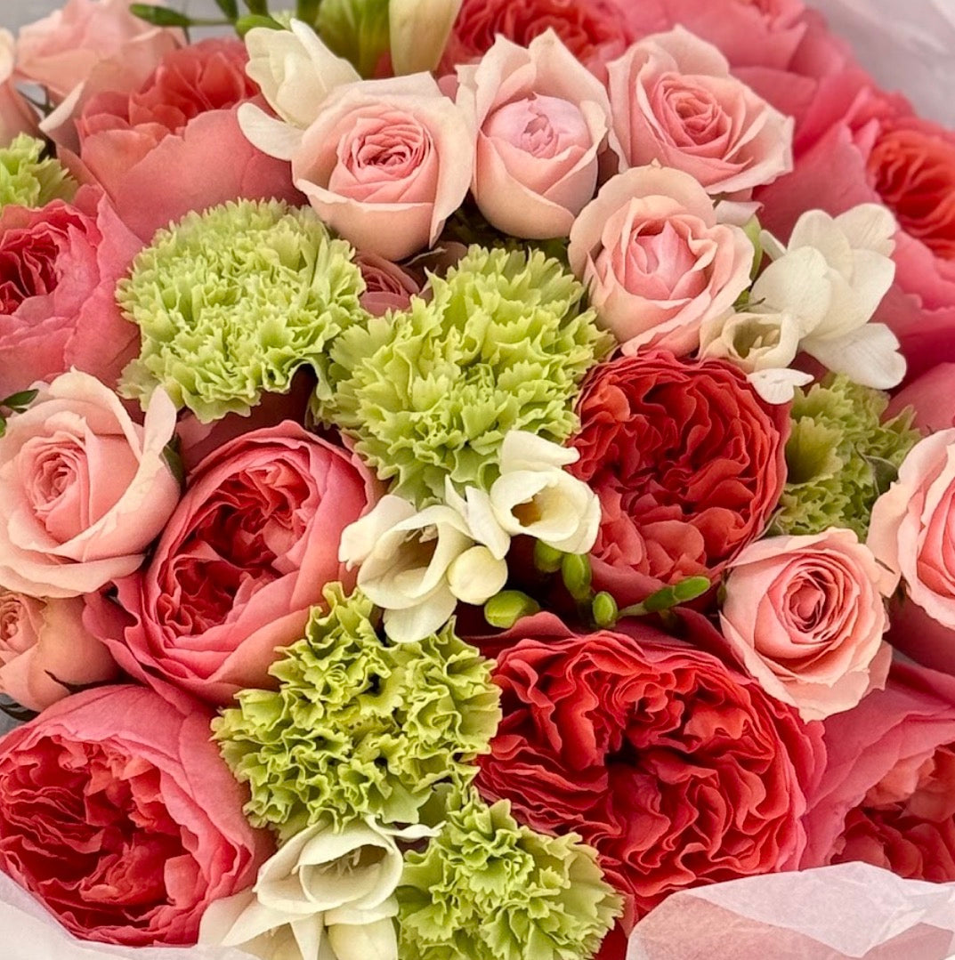 No.24 TENDER BLOOM - pink x-pression roses, freesia, carnations, spray roses